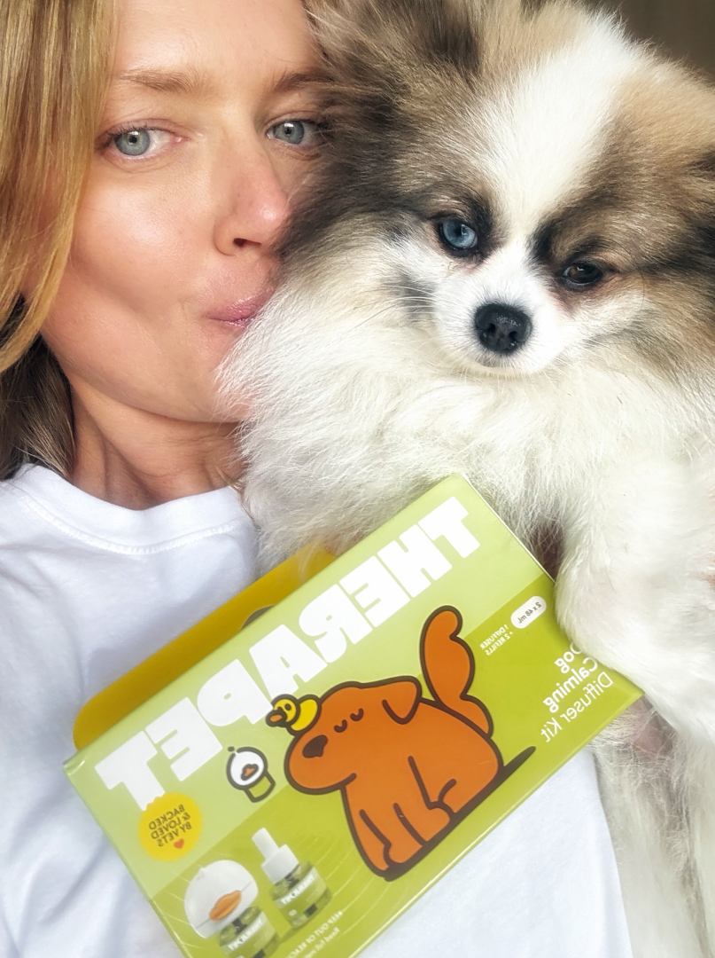 Pet parent with a calm dog
